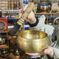 Tibetan brass singing bowl with Sanskrit – handmade meditation instrument for stress relief.