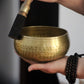 Tibetan brass singing bowl with Sanskrit – handmade meditation instrument for stress relief.
